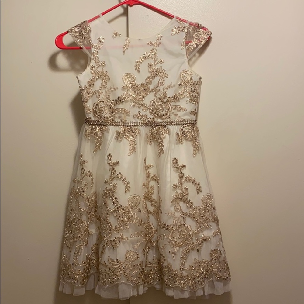 Rare Editions girl gold sequin dress.